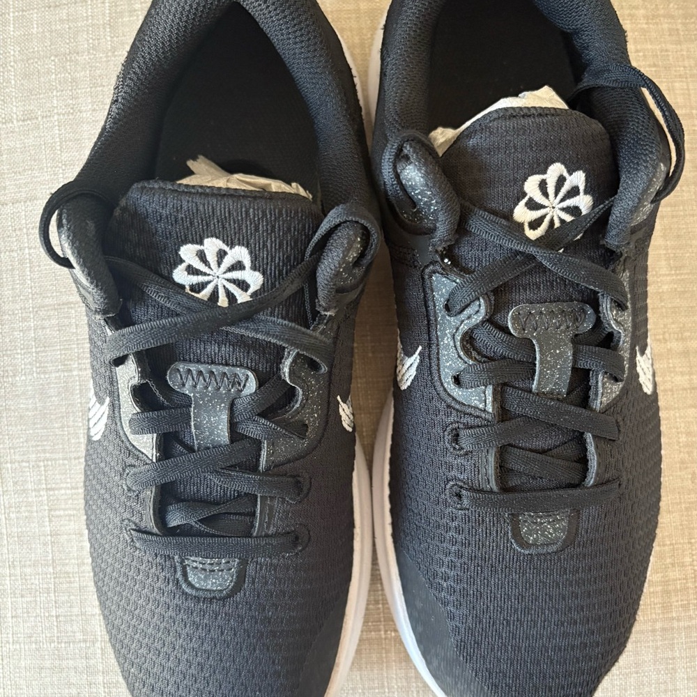 Nike Women’s Flex Experience Run 11 Next Nature running shoes.